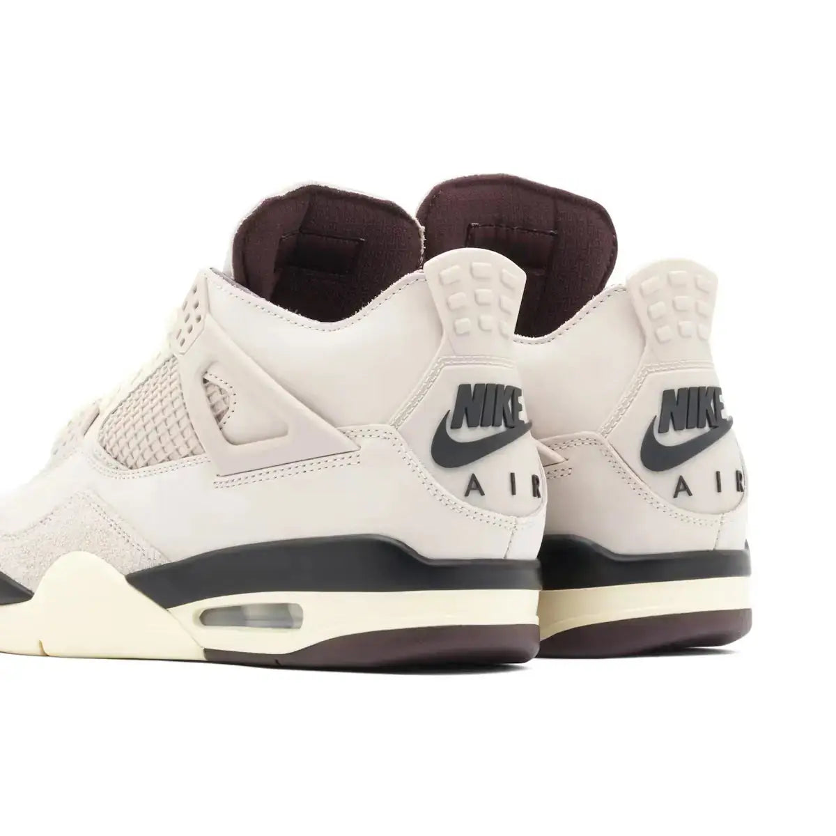 Rear view of A Ma Maniere x Wmns Air Jordan 4 Retro sneakers, featuring Nike Air branding and Violet Ore suede heel accents.