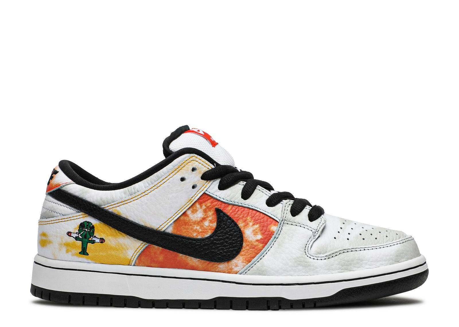 Dunk SB Low Tie-Dye Raygun sneaker in white with vibrant tie-dye paneling, black swoosh, and alien patch. Retro Nike design with premium leather.