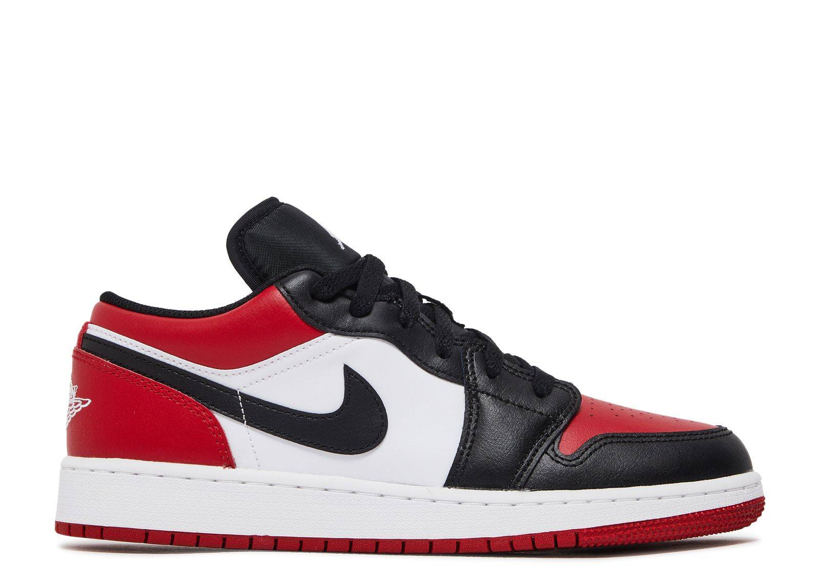 Air Jordan 1 Low GS Bred Toe sneaker featuring black, white, and red leather panels, puffy nylon tongue, and red outsole. Grade school sizing.