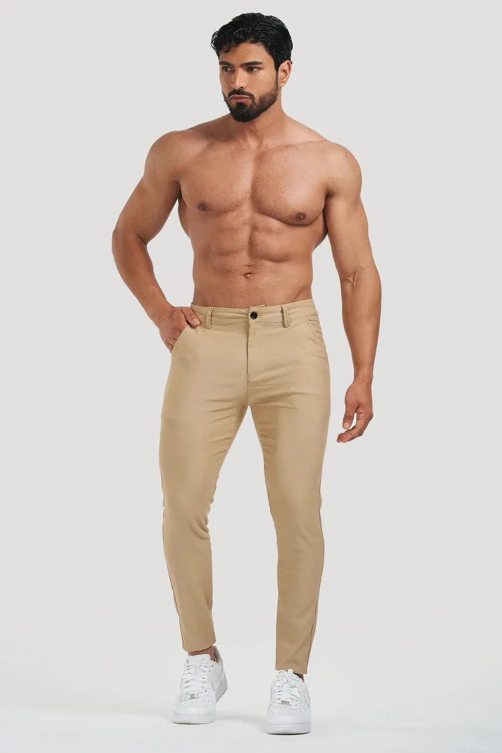 Avari Trousers Cream slim fit showcased on a model, highlighting the stylish and tailored design for men.