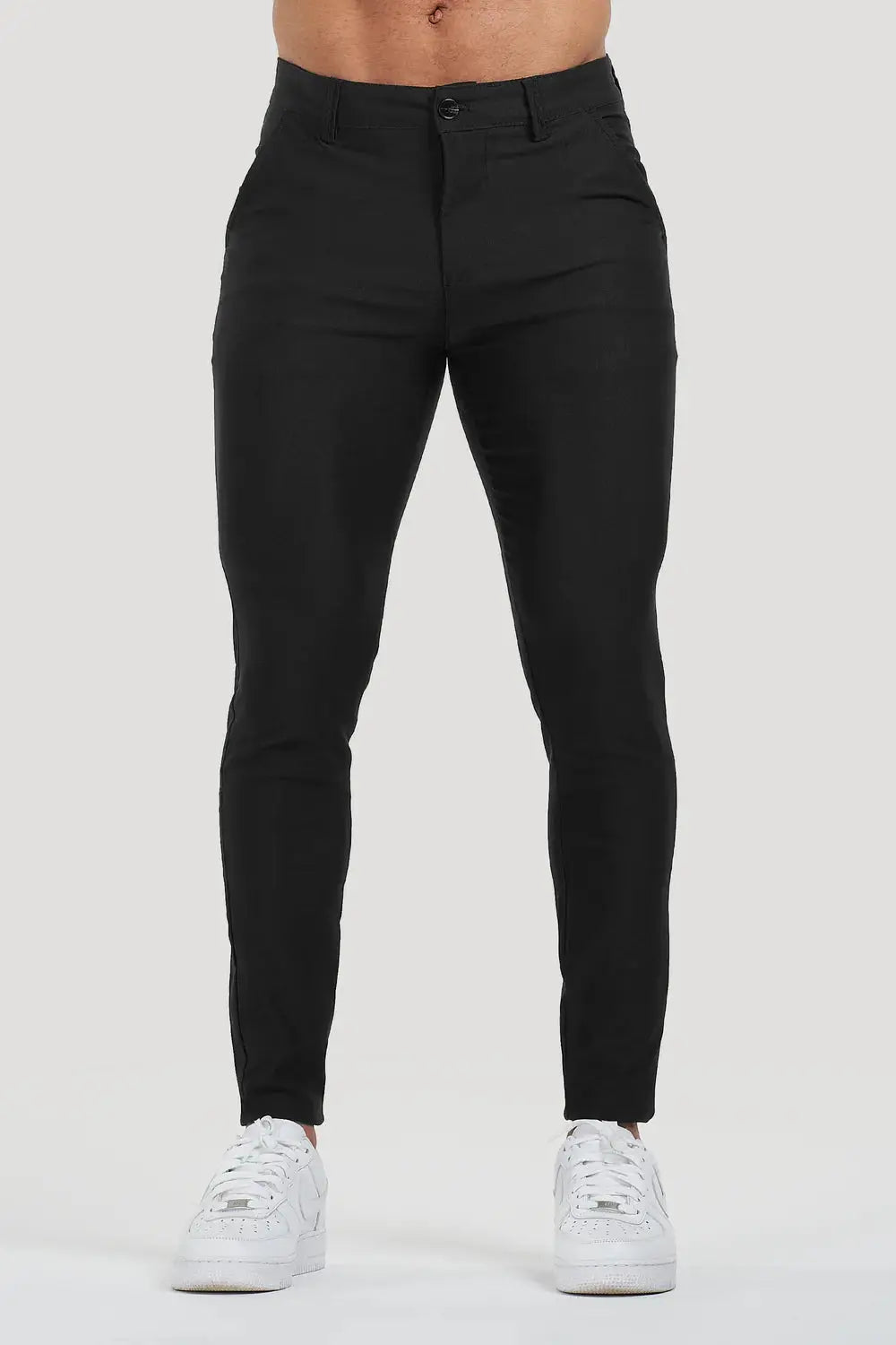 Front view of Avari Trousers Black, showcasing the slim-fit tapered design and comfortable wear for any occasion.