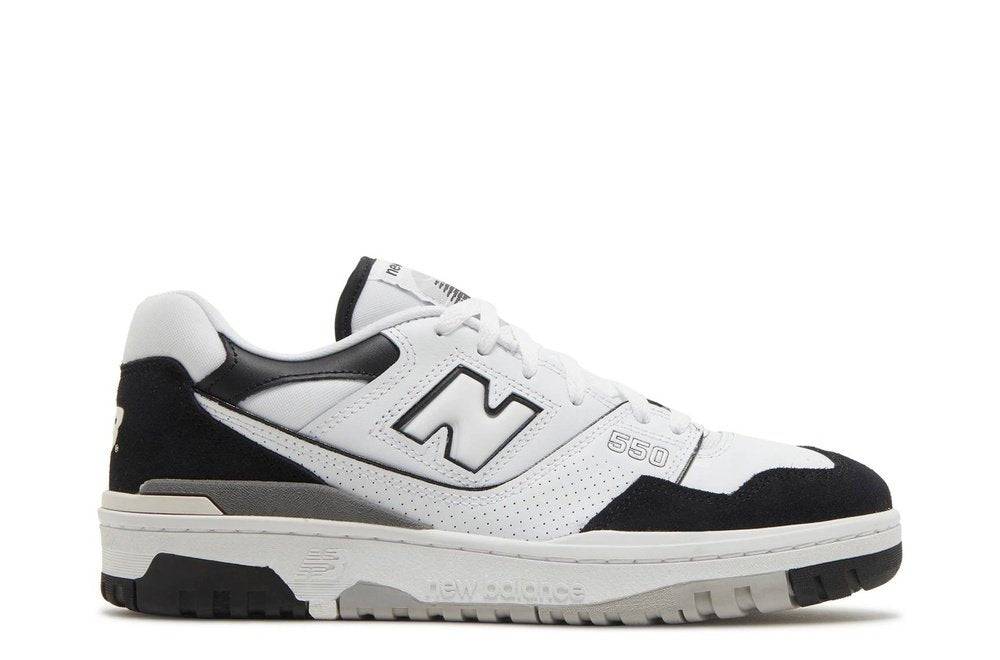 New Balance 550 White Black retro sneaker reissue featuring a white leather upper with black suede accents, cushioned midsole, and durable rubber outsole.