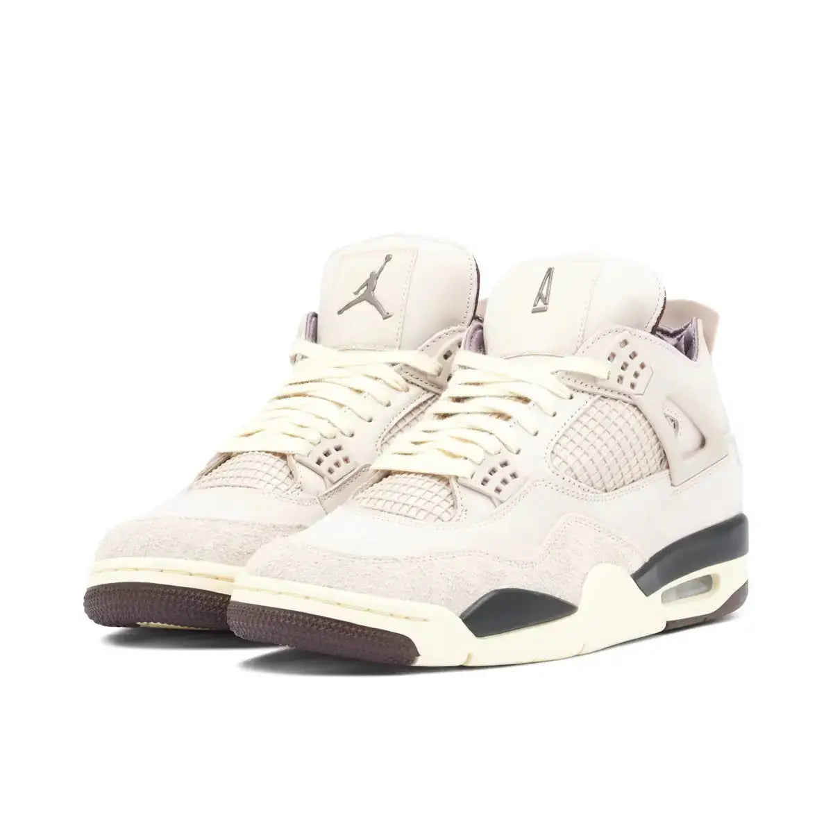 Front angled view of A Ma Maniere x Wmns Air Jordan 4 Retro sneakers, highlighting the premium materials and quilted lining.