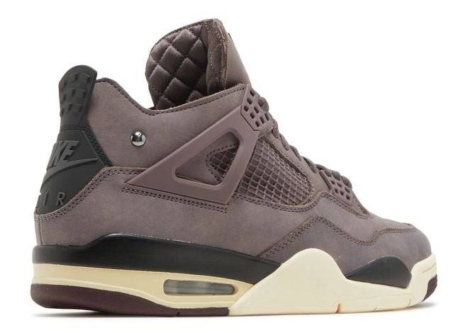 Rear view of A Ma Maniere Air Jordan 4 Retro Violet Ore sneaker highlighting Nike Air branding, quilted interior, and premium craftsmanship.