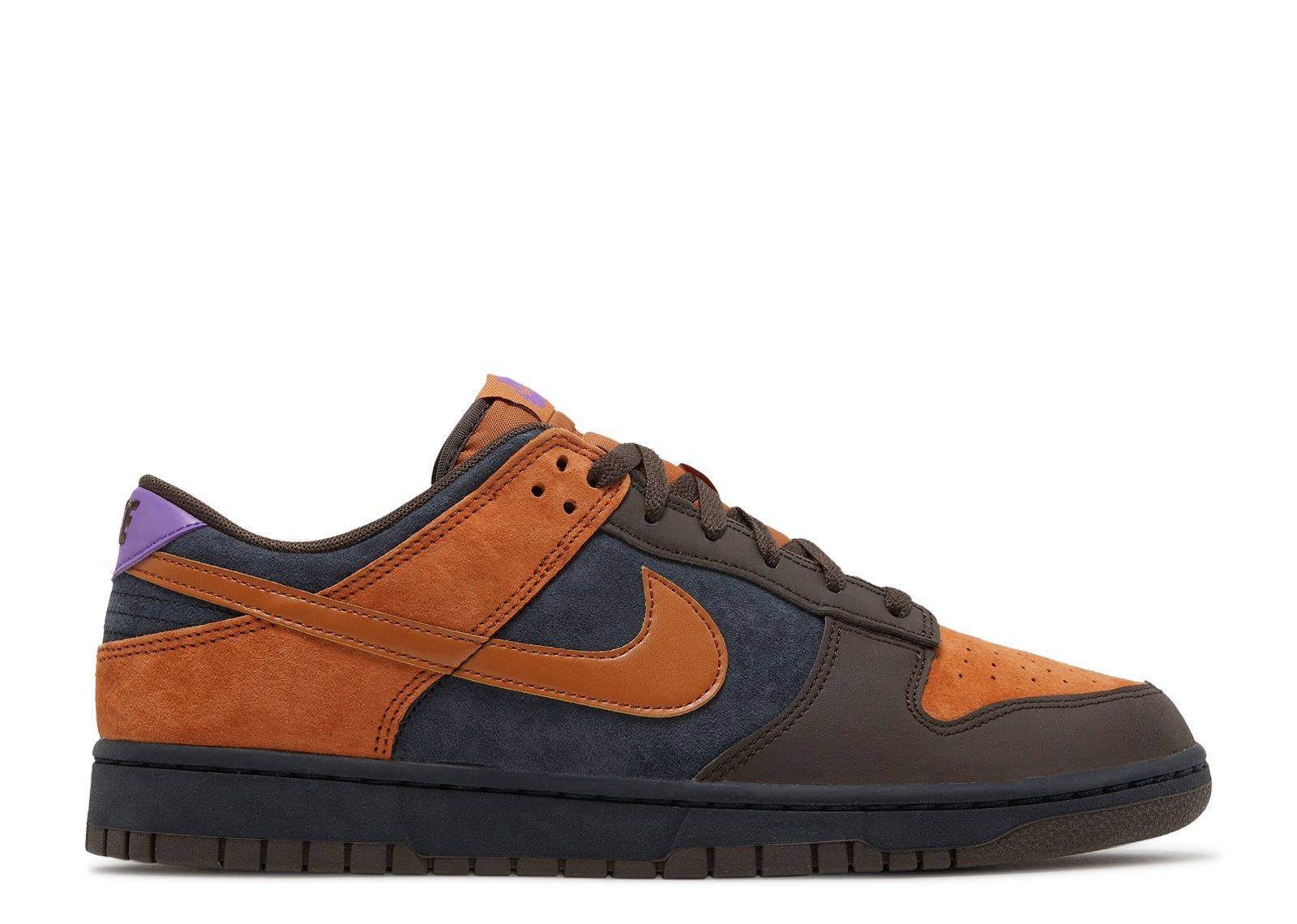 Nike Dunk Low Premium Cider sneakers featuring a mix of brown suede and black leather with a contrasting orange Swoosh and branded purple heel.