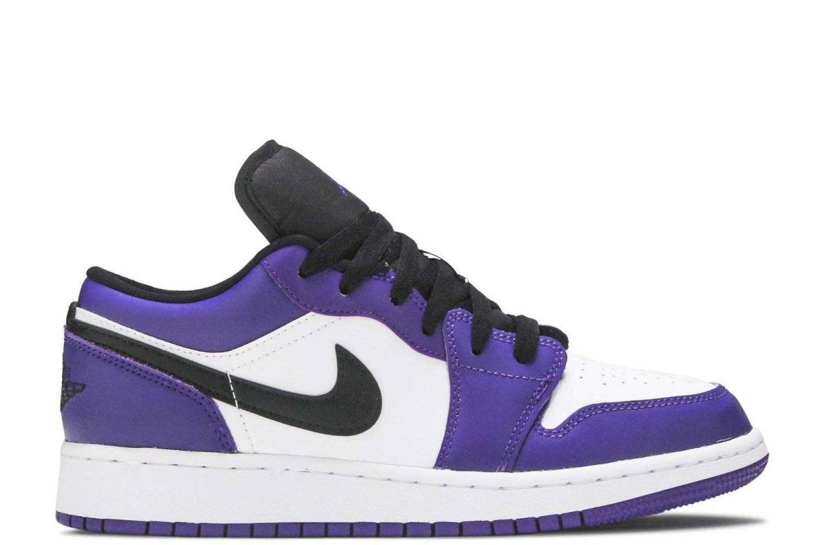 Air Jordan 1 Low GS Court Purple sneaker for kids with white leather base, purple overlays, black laces, and Nike Swooshes. Features Jumpman and Wings logos.