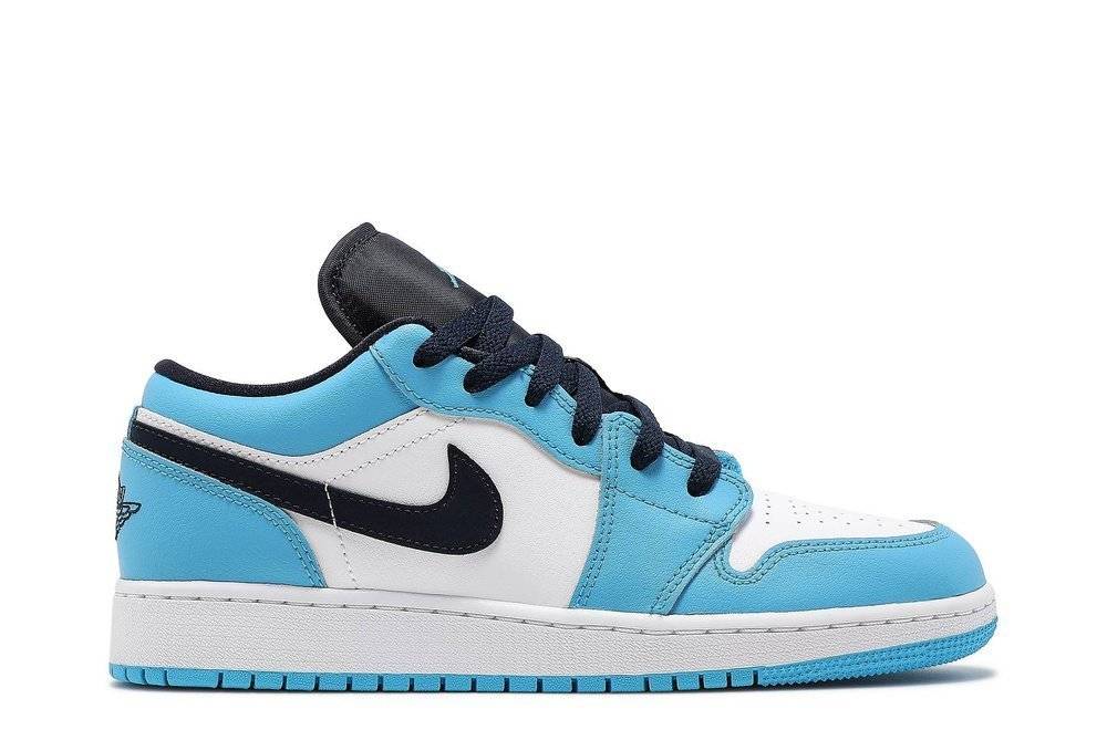 Air Jordan 1 Low GS UNC sneaker featuring white leather base, light blue overlays, and navy accents. Iconic design for sneaker enthusiasts.