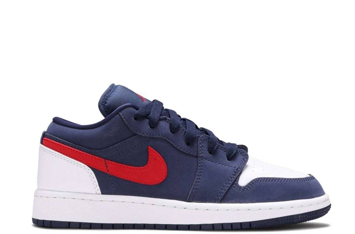 Air Jordan 1 Low GS USA sneaker featuring a durable leather upper in navy blue, white, and red accents with a perforated toe and padded fit.