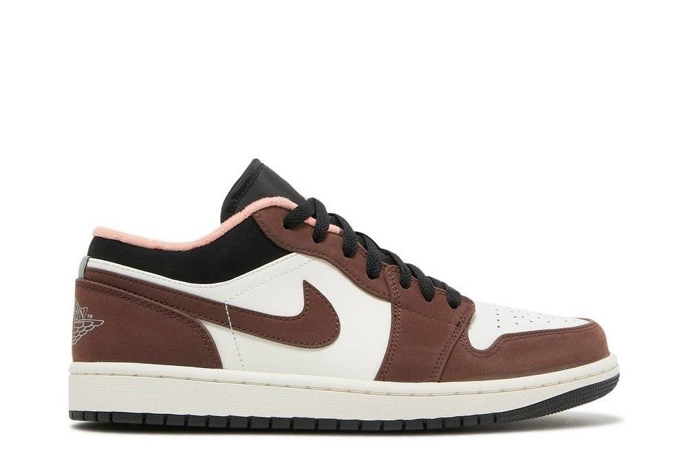 Air Jordan 1 Low Mocha sneaker featuring a white leather upper, Dark Mocha suede overlays, black laces, and a perforated toebox for breathability.