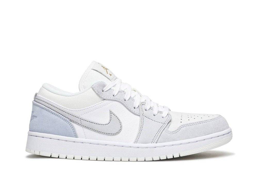 Air Jordan 1 Low Paris sneakers in white, Sky Grey, and Football Grey with premium leather and textile design. Limited edition stylish footwear.