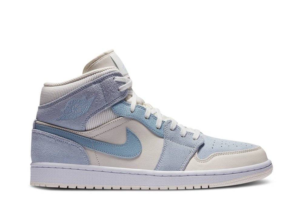 Air Jordan 1 Mid SE Sail Blue sneaker featuring premium leather and suede in light blue and cream tones. Iconic design for stylish footwear enthusiasts.