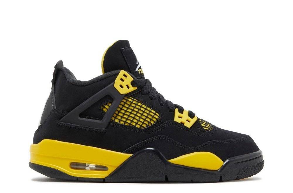 Air Jordan 4 Retro GS Thunder 2023 sneaker in black and tour yellow with leather and mesh upper, visible Air unit, and durable rubber outsole.