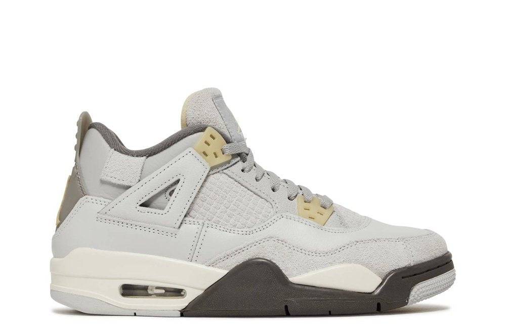 Air Jordan 4 Retro SE GS Craft sneaker in pale grey with leather and suede design, featuring molded eyelets and exposed Air-sole cushioning.