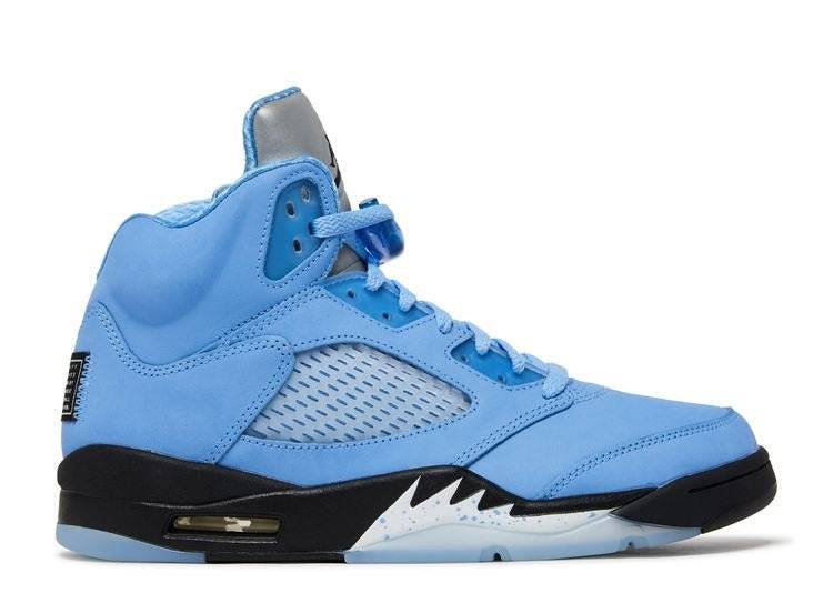 Air Jordan 5 Retro UNC sneaker in signature University Blue suede with reflective tongue, black midsole, and translucent outsole.