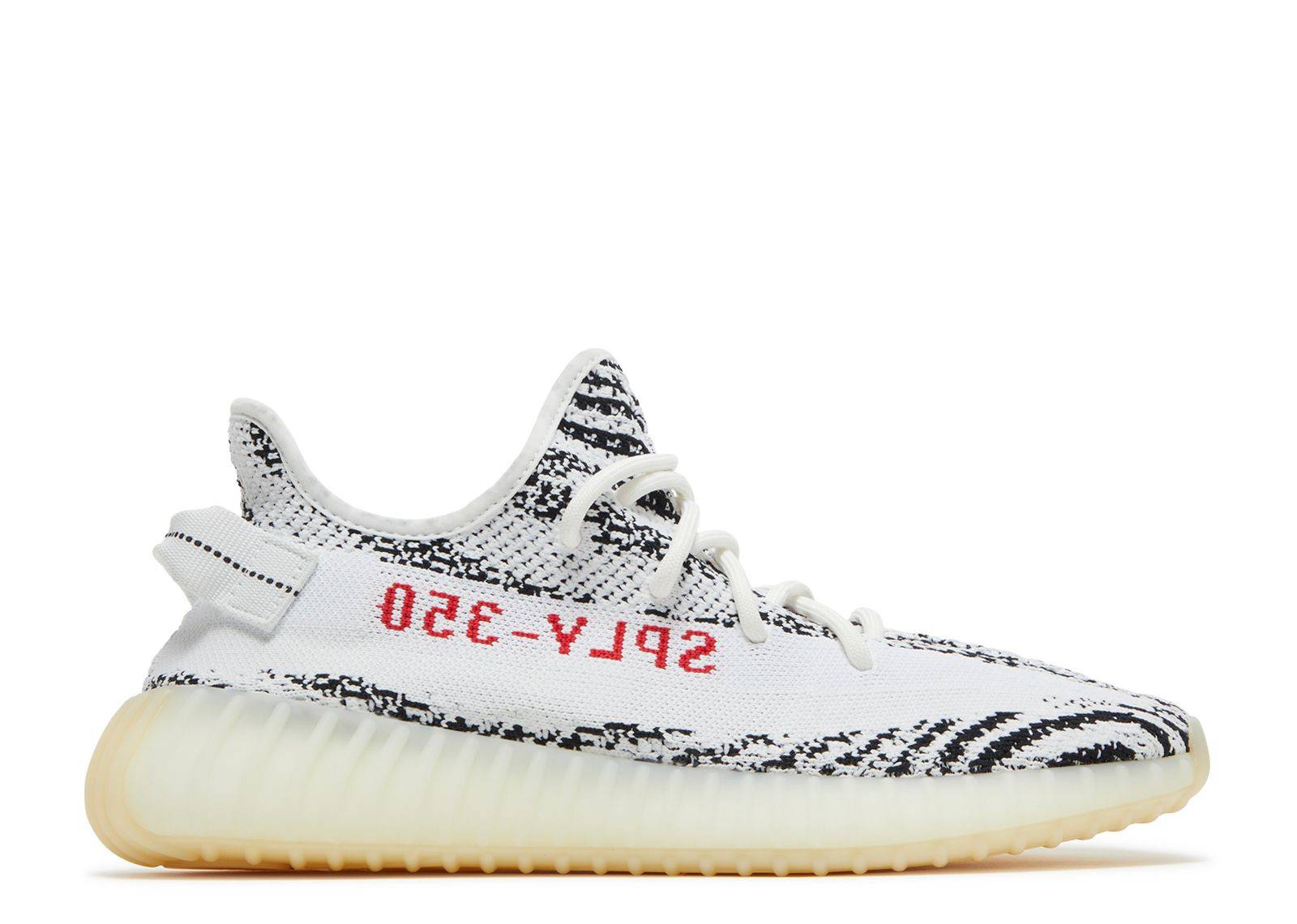 Yeezy Boost 350 V2 Zebra sneaker featuring a white and black Primeknit upper, red 'SPLY-350' text, and cushioned Boost sole for comfort and style.