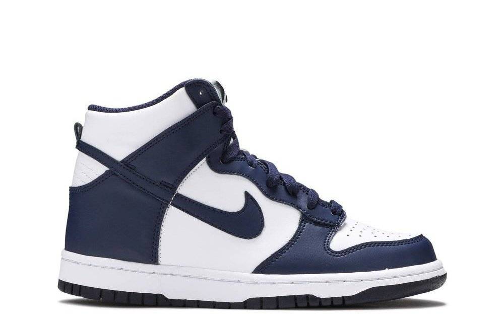 Nike Dunk High GS Midnight Navy sneaker with white leather upper, navy overlays, and perforated toe box. Stylish design for casual wear.