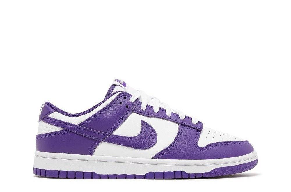 Nike Dunk Low Championship Purple sneaker with white leather upper and purple overlays, featuring a classic 1985 design.