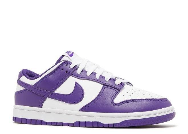 Side view of Nike Dunk Low Purple sneaker showcasing white leather base, purple overlays, and iconic Swoosh logo.