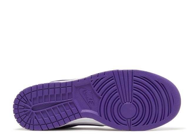 Outsole of Nike Dunk Low Purple sneaker in vibrant purple rubber, offering durability and traction for everyday wear.