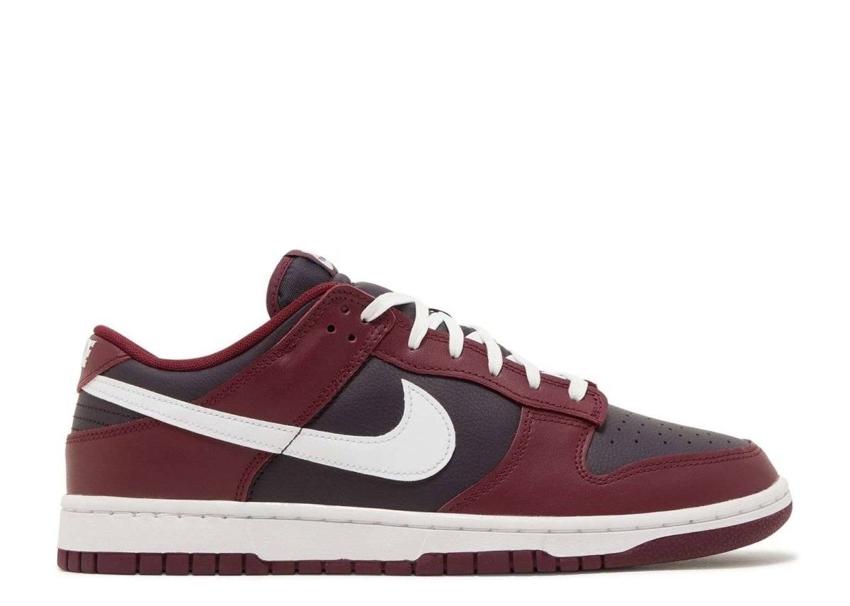 Nike Dunk Low Dark Beetroot sneaker featuring tumbled leather in dark beetroot and white accents, with Nike branding and a low-top design.