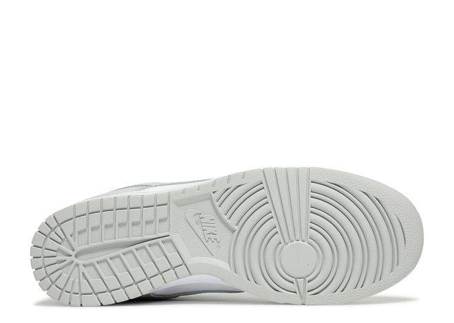 Nike Dunk Low Grey Fog sneaker outsole in Grey Fog color, displaying detailed tread pattern for traction.