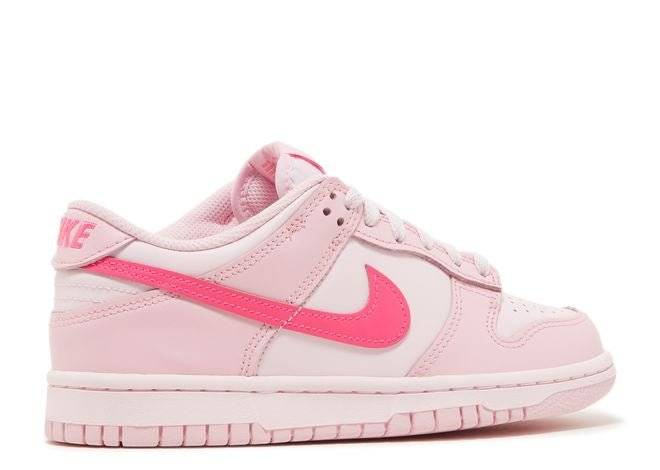 Nike Dunk Low GS Triple Pink sneaker in light pink with bold pink Swoosh, rear side view highlighting heel branding and sleek design.