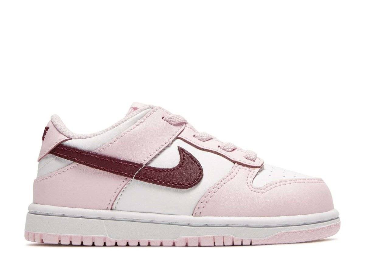 Nike Dunk Low PS Valentines Day sneaker in burgundy and sail leather with pink Swoosh, designed for Valentine's Day. Limited edition release, size EU33.