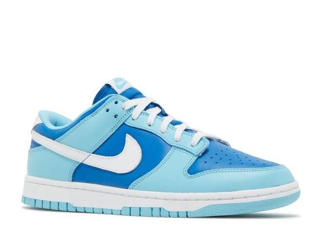 Nike Dunk Low Retro QS Argon 2022 sneaker showcasing marine blue and powder blue leather upper, white Swoosh, and nylon tongue, angled front view.