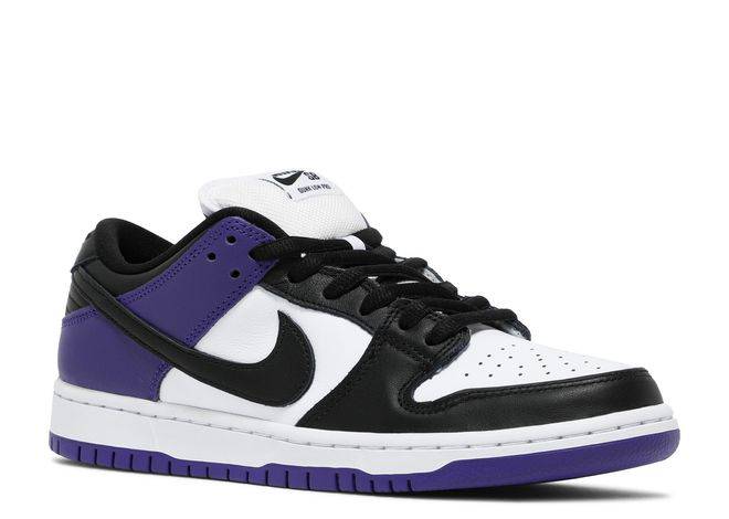 Side view of the Nike Dunk Low SB Court Purple sneaker showcasing black swoosh, white leather upper, and purple accents. Stylish and durable.