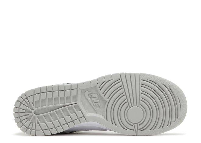 Outsole of the Nike Dunk Low SE Lottery Pack Grey Fog sneaker displaying its durable grey rubber sole with traction pattern for grip.