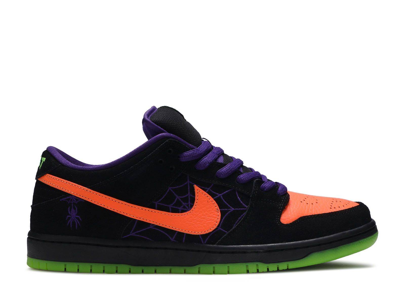 Dunk Low SB Night of Mischief sneaker featuring black suede, orange leather accents, purple laces, and Halloween motifs like spiderwebs and Jack-O-Lantern details.