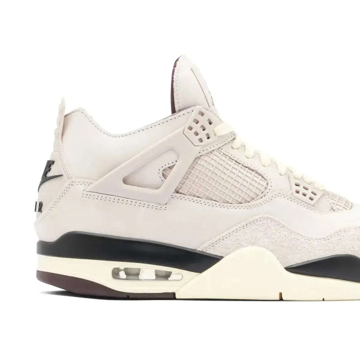 Close-up side view of A Ma Maniere x Wmns Air Jordan 4 Retro sneaker showcasing light grey leather, Violet Ore suede, and midsole detailing.