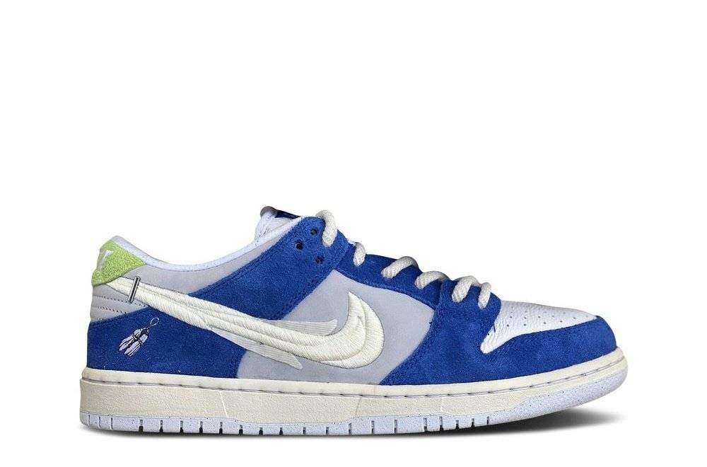 Fly Streetwear x Dunk Low Pro SB sneaker featuring blue suede overlays, white leather base, and Gardenia flower-inspired details. Collaboration with Nike SB.