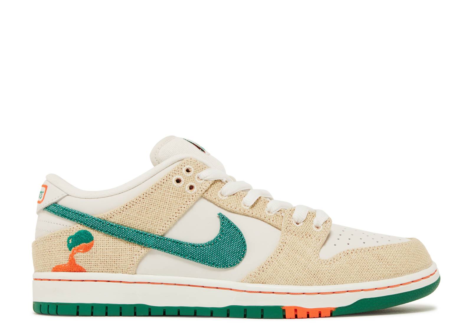 Jarritos x Dunk Low SB sneaker featuring tear-away beige canvas, green Nike Swoosh, and orange accents. Includes white laces and Jarritos branding.