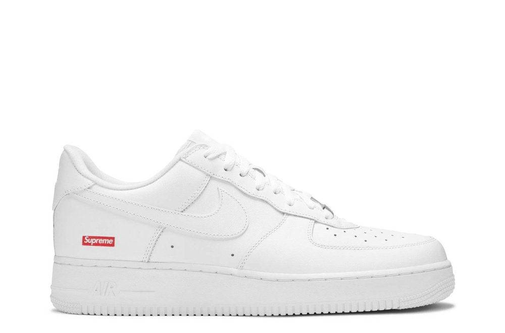 Supreme x Air Force 1 Low Box Logo in white, featuring a minimalist design with a red Supreme logo on the heel. Iconic streetwear sneaker.