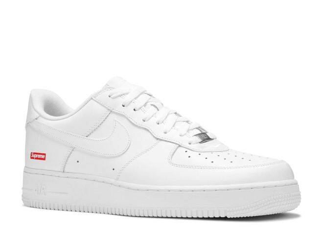 Supreme Air Force 1 Low Box Logo - White, showcasing a side angle with premium leather and the signature red Supreme logo on the heel.