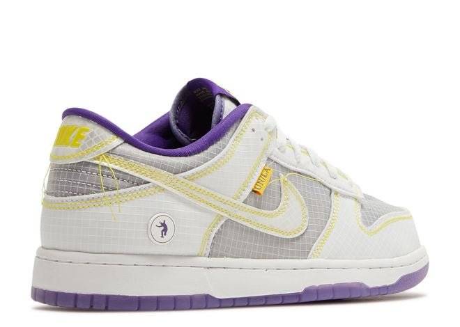 Side view of Union LA x Dunk Low Court Purple sneaker showcasing the Union LA logo, yellow accents, and purple outsole.