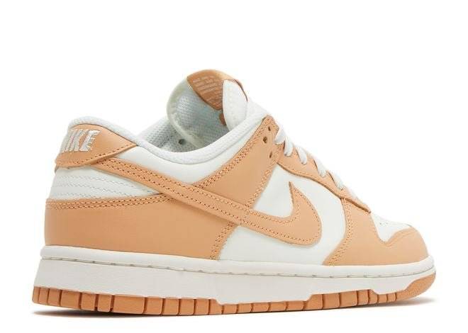 Rear view of Nike Dunk Low Harvest Moon sneaker highlighting the embroidered Nike logo on the heel and light brown leather accents.