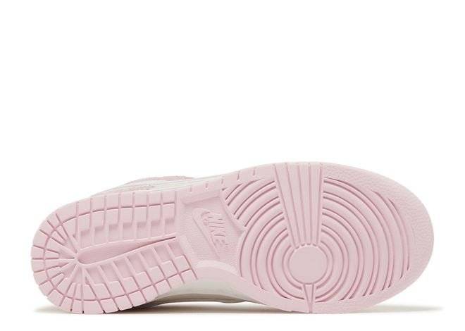 Outsole of Nike Dunk Low LX Pink Foam sneaker in light pink rubber, featuring a durable tread pattern for traction and style.