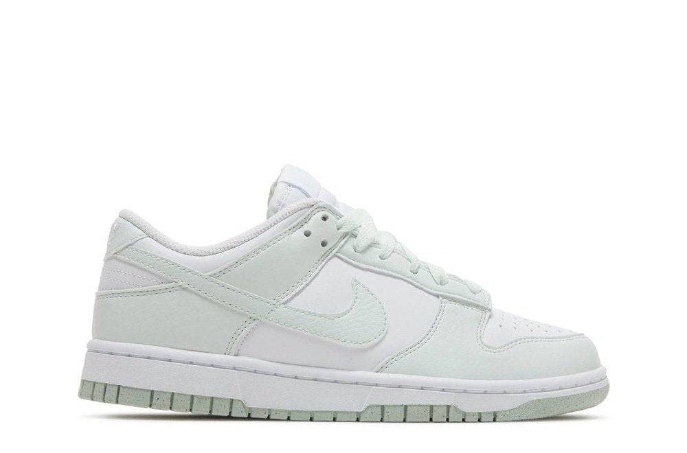 Wmns Dunk Low Next Nature - Nike Dunk Low Mint sneaker in white and mint green, featuring a sustainable design made from 50% recycled materials.