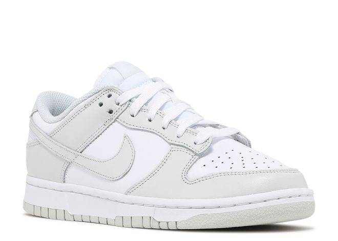 Nike Dunk Low Photon Dust sneaker showcasing a front-side angle, highlighting perforated toe box, white laces, and eco-friendly materials.