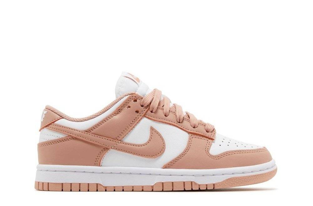 Wmns Dunk Low Rose Whisper sneaker in white and Rose Whisper leather with a retro low-top design, ideal for summer wear.