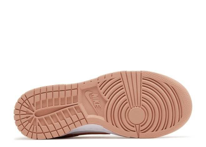 Outsole of the Wmns Dunk Low Rose Whisper sneaker with durable rubber traction in a Rose Whisper tone for everyday wear.