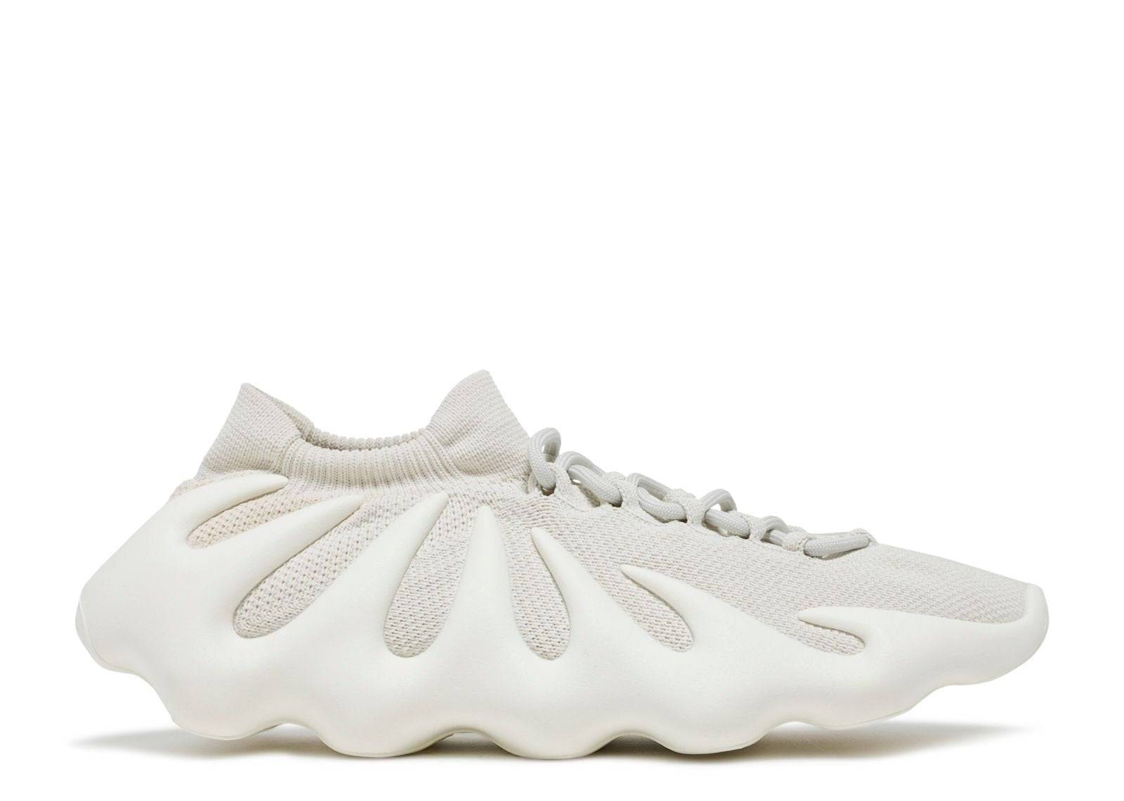 Yeezy 450 Cloud White sneaker featuring a unique foam sole exoskeleton design and a breathable knit upper, ideal for comfort and style.