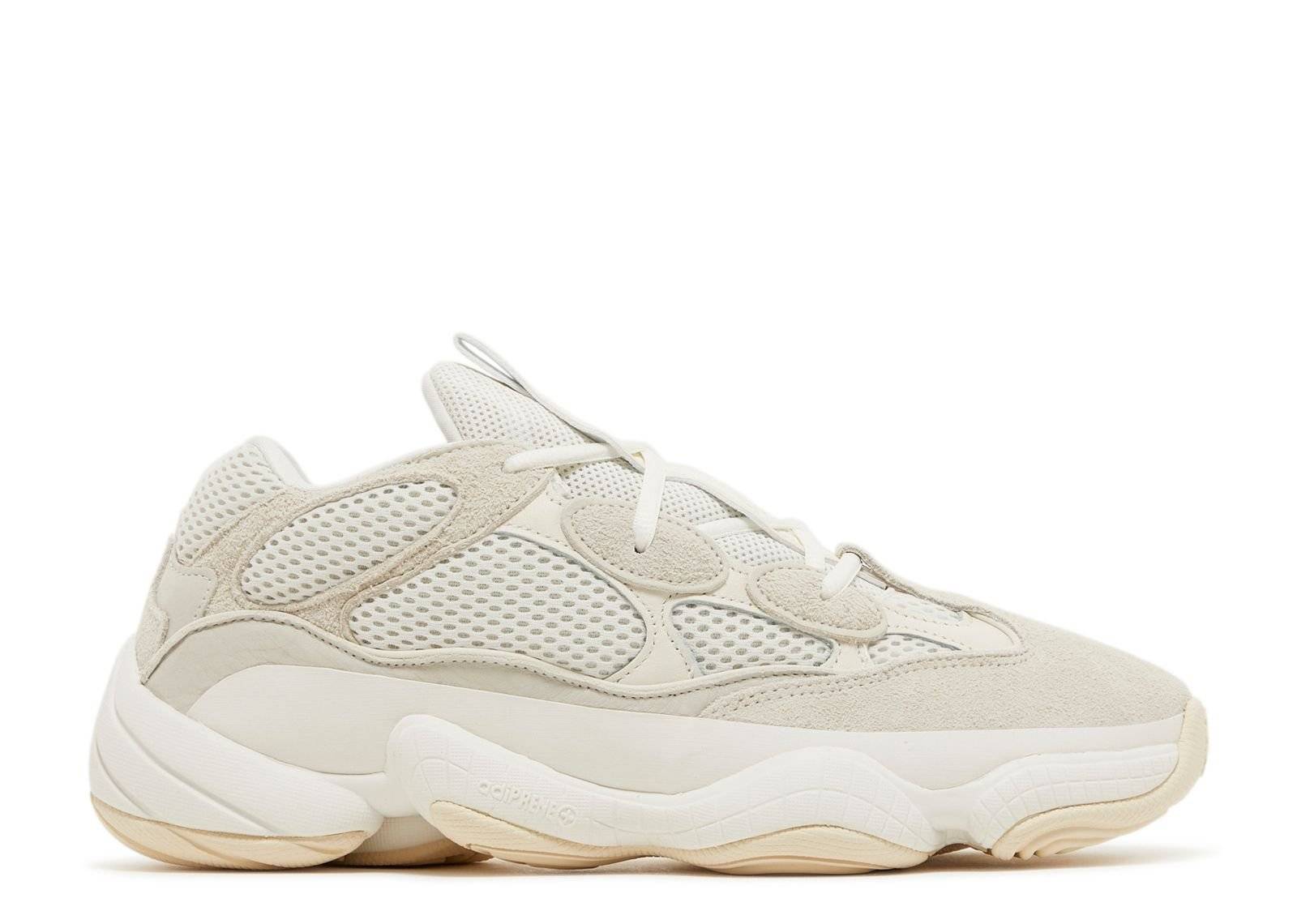 Yeezy 500 Bone White 2023 sneaker featuring a mesh and suede upper, adiPRENE cushioning, and a chunky sole in a neutral bone white colorway.