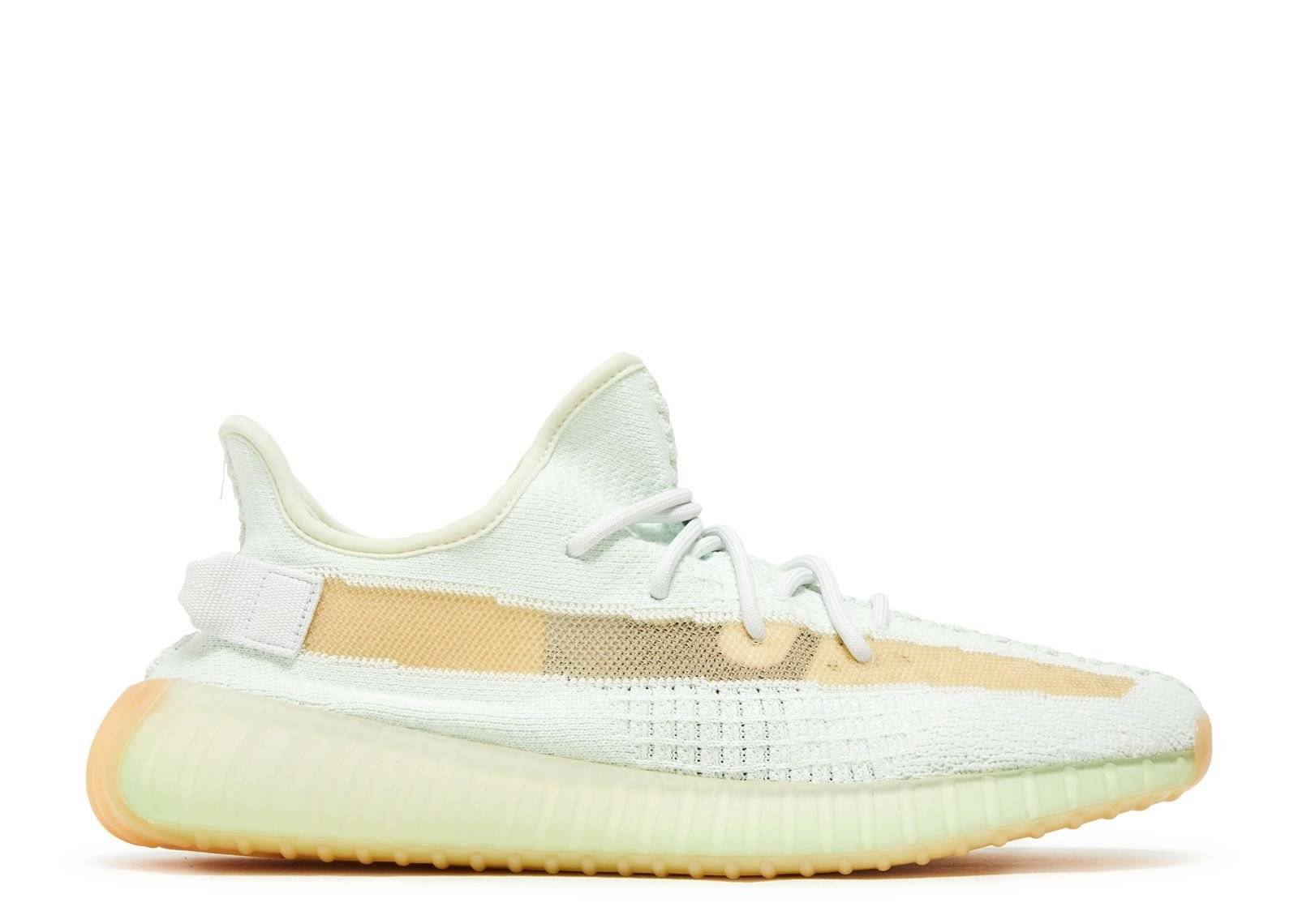 Yeezy Boost 350 V2 Hyperspace 2023 sneaker featuring a light grey upper, translucent stripe, and gum sole. Limited edition footwear for sneaker enthusiasts.