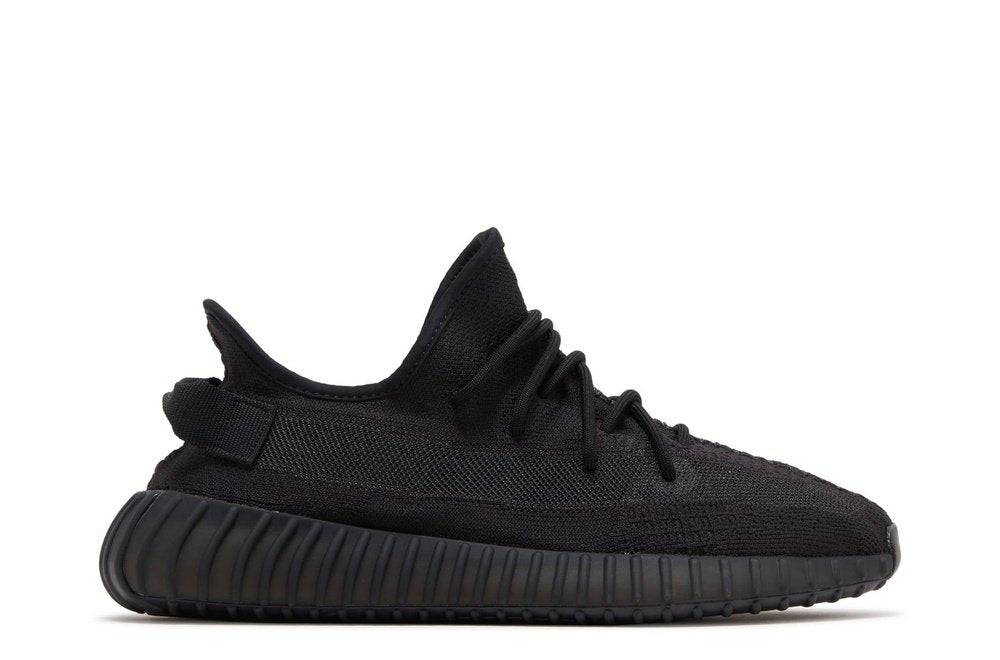 Yeezy Boost 350 V2 Onyx sneaker featuring a black Primeknit upper, mesh stripe, and Boost sole for comfort. Perfect for casual wear.